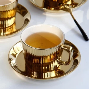 Juego de tazas de café y platillos de té de cerámica de lujo enchapados en oro de 250 ml - Imagen 1 de 5