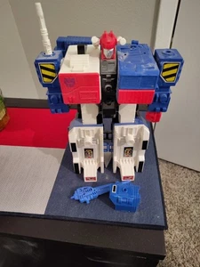 LO ÚLTIMO Transformation Blue Metroplex Ko G1 Tres Transformaciones Figuras de Acción Juguete - Imagen 1 de 1