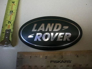 LAND ROVER EMBLEMA OVALADO VERDE NEGRO OEM ORIGINAL USADO BOLSA GENUINA - Imagen 1 de 2