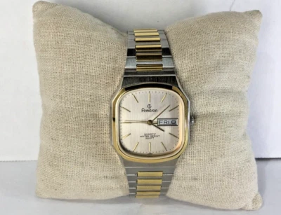 Reloj Cuadrado Armitron Qrtz con Indicador de Día/Fecha y Correa Tonificada Plateada y Dorada Funciona Foto 1 de 4