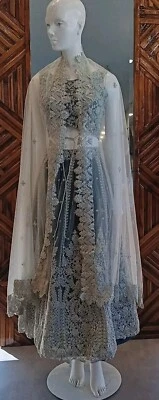 Impresionante ropa de fiesta de diseñador de boda indio Lehenga Bollywood Foto 1 de 4