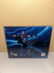 AJ Styles WWE Autographed 8x10 Entrance with Arms Out Photograph - Picture 1 of 2