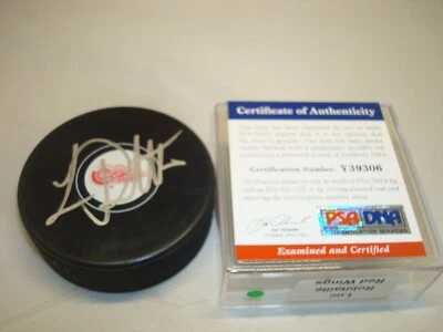 Luc Robitaille Signed Detroit Red Wings Hockey Puck Autographed PSA/DNA COA 1A - Image 1 of 3