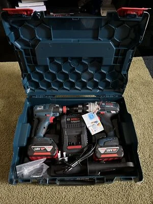 Bosch Professional 0615990J8A 18V 2 Piece Brushless Tool Kit + 2 x 5Ah Batteries - Image 1 of 4