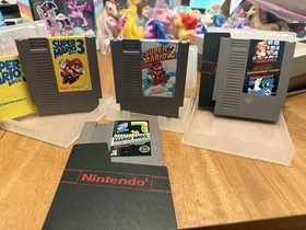 Super Mario Bros. 1, 2, 3 Trilogy e Arcade Classics con parapolvere Autore NES