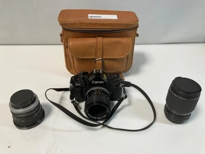 Canon AE-1 35mm Film Camera w/ x3 Lenses: 20mm, 50mm, 25-105mm - Untested, As Is - Image 1 of 4