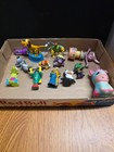 LOT OF ASSORTED FIGURES, KEYCHAINS, USB CAR PHONE CHARGER PLUG