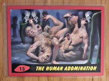 MARS ATTACKS THE REVENGE 2017  RED BOARDER CARD 13 THE HUMAN ABOMINATION