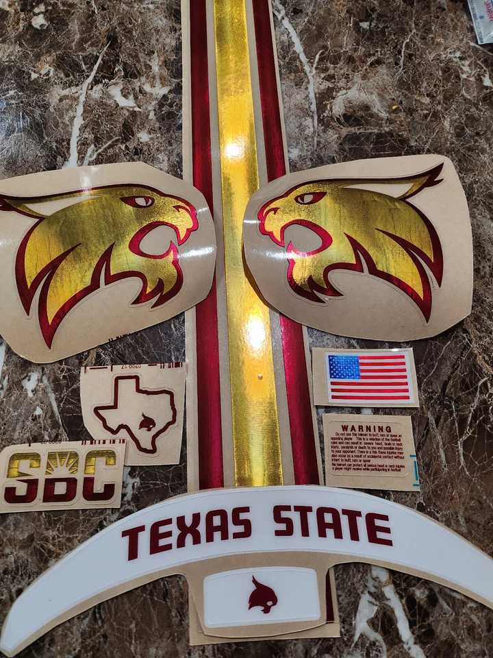 Casco de fútbol americano Texas State Bobcats 20 mil 3M calcomanías de vinilo cromo oro borgoña Foto 1 de 1