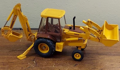 Vtg ERTL CASE 580K Tractor Loader Backhoe Yellow Die Cast Metal 1/32 Scale - Image 1 of 4