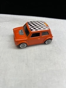 Hot Wheels Power Launcher Orange Mini Cooper Car with Checkered Top - Picture 1 of 5