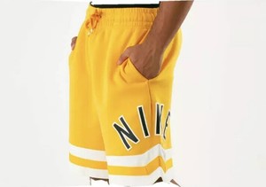 yellow nike shorts