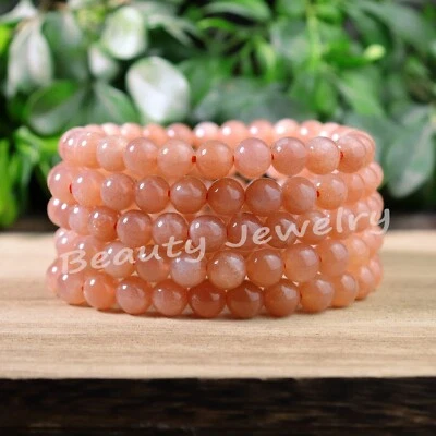Venta al por mayor 5 piezas pulsera elástica curación piedra solar naranja melocotón 7 mm 6,7" Foto 1 de 4
