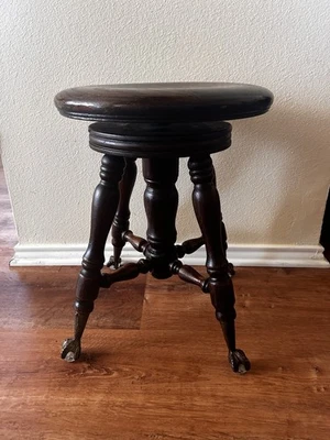 Antiguo taburete de piano giratorio de madera con patas de vidrio con garra Foto 1 de 4