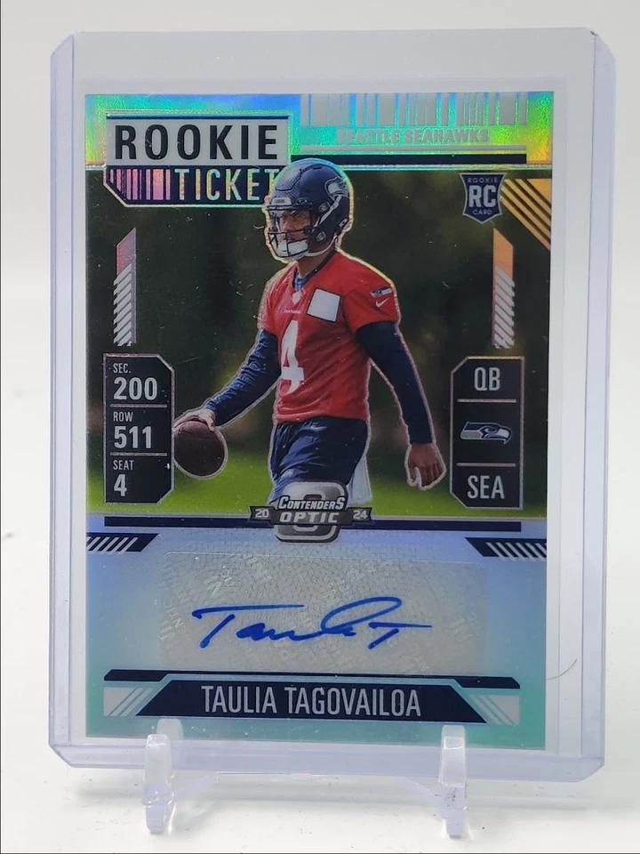 TAULIA TAGOVAILOA 2024 CONTENDERS OPTIC ROOKIE SILVER PRIZM RC AUTO Q0358 - Image 1 of 2