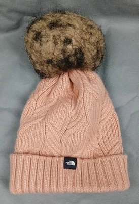 Gorro tejido con pompón de piel The North Face Oh-Mega juvenil rosa arcilla talla única Foto 1 de 4