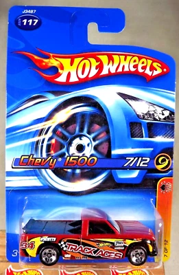 Chevy 1500 2006 Hot Wheels #117 Track Aces 7/12 rojo oscuro con ruedas cromadas de 5 radios Foto 1 de 4