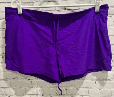 Pantalones cortos deportivos elásticos con aberturas laterales forrados púrpura brillante BCC 16 Foto 1 de 4