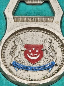 MAJULAH SINGAPORE SWISS QUALITY VINTAGE BOTTLE OPENER THE EASTERN GOLDSMITH WBOX - Picture 1 of 5