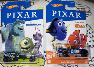 2 Hot Wheels Disney Pixar 2020 character cars Finding Nemo & Monsters Inc New - Picture 1 of 6