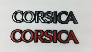 OEM GM Chevy Corsica Emblems (2) ~ Original Scripted GM Red & Chrome ~ Plastic - Picture 1 of 4