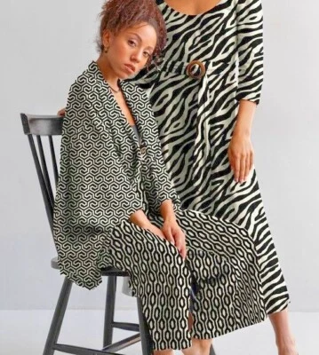 Gorgeous Black Magnolia Graphic Stretch Dress Fabric M1843 - Image 1 of 4