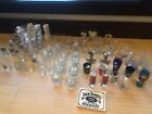 Variety of 90 shot glasses and 3 sake drinkers, Louisville, Kentucky, checkers