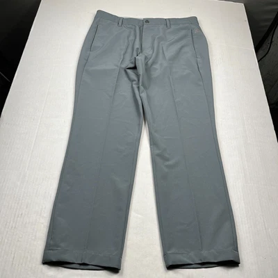 Pantalones de golf ligeros Adidas para hombre gris rendimiento frente plano cremallera talla 34 x 30 Foto 1 de 4