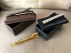 Set of 3 metal tie bars, 2 silver colour both boxed, 1 gold colour unboxed