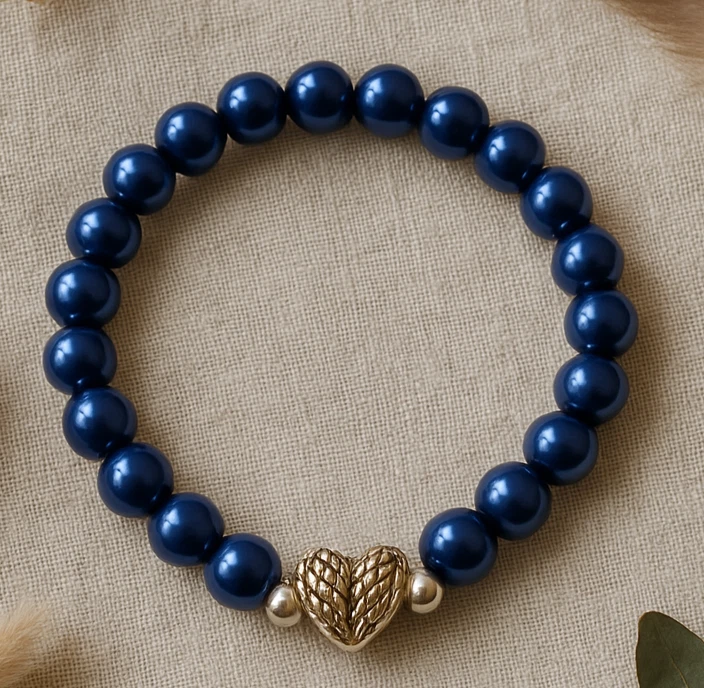 Pulsera elástica elástica elástica de perlas de vidrio azul real y dije de corazón tibetano plateado Foto 1 de 1