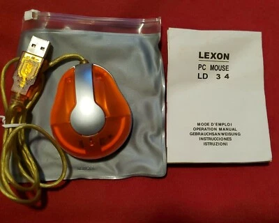 Dispositivo de entrada de computadora Lexon PC práctico diseño por Theo Williams naranja transparente  Foto 1 de 4