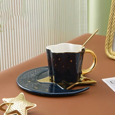 Taza y platillo de cerámica creativa estrella luna con cuchara mango dorado taza taza taza de té Foto 1 de 4