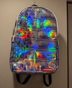 SPRAYGROUND Rucksack holografisch Geld selten Laptop Tablet Buch - Bild 1 von 24