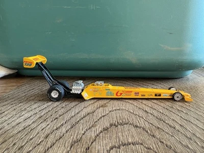 Coche Racing Champions Eddie Hill Dragster 1/64 Pennzoil amarillo fundido a presión Foto 1 de 4