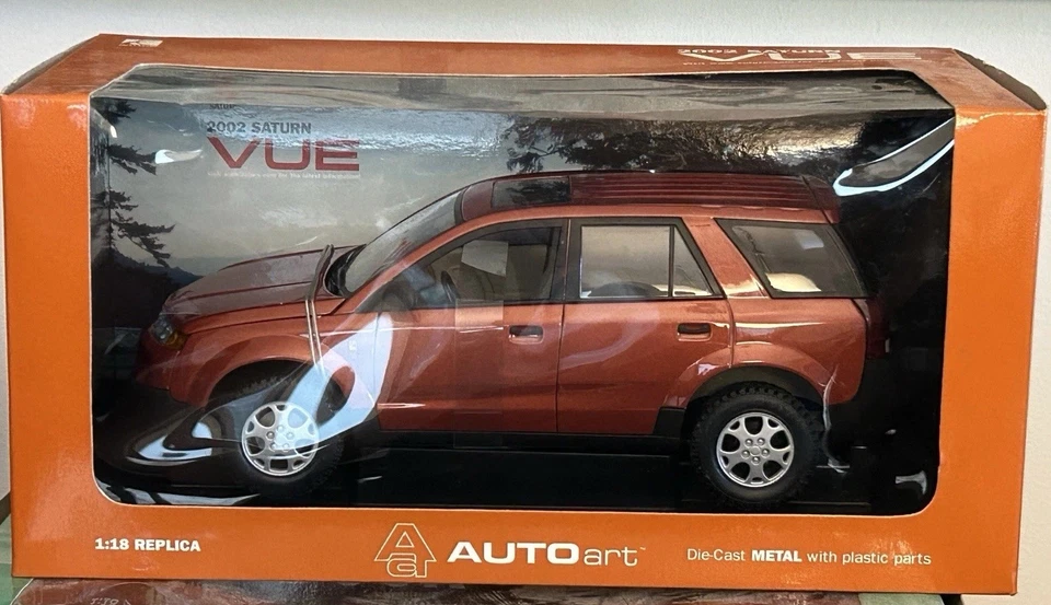 AutoArt 2002 Saturn Vue concesionario coche fundido a presión naranja metálico 1:18  Foto 1 de 3