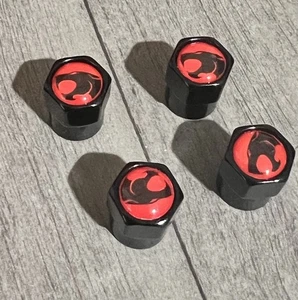 4x Cool Thundercats Cartoon Car Bike Tire Valve Stem Caps Red Logo NEW Cap Cover - Picture 1 of 4