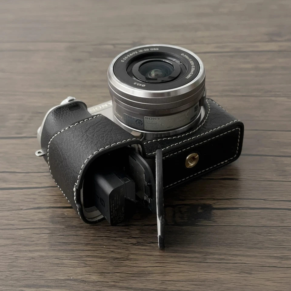 Funda para cámara Sony A6400 A6300 A6000 con botón magnético trípode tornillo (negro) Foto 1 de 4