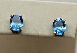 Signed 14k Yellow Gold Oval Cut BLUE TOPAZ PRONG SET STUD EARRINGS - Picture 1 of 10
