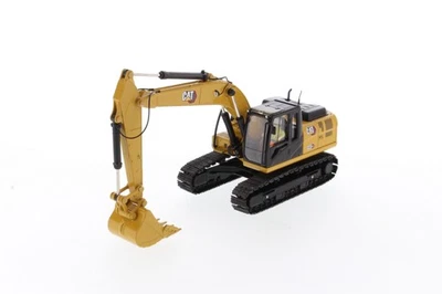 DIECAST MASTERS, Escavatore cingolato CATERPILLAR 323 GX, 1/50,  DCM85675 - Immagine 1 di 4