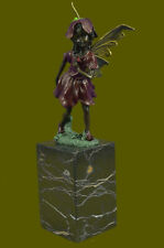 Fairy Standing with a flower Garden Statue in aged bronze finish. 13" Tall Decor