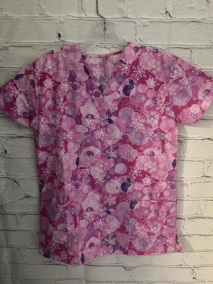 Unbranded Pink Snowflake Themed Scrub Top Women's Size XS - Image 1 of 4