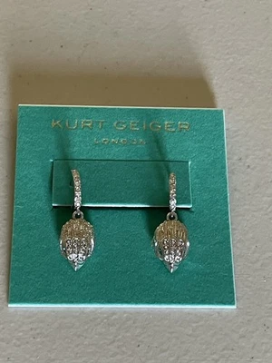 "PENDIENTES DE ARO HUGGIE CON ENCANTO DE ÁGUILA PAVÉ FIRMA TONO PLATEADO KURT GEIGER LONDRES 1""" Foto 1 de 4