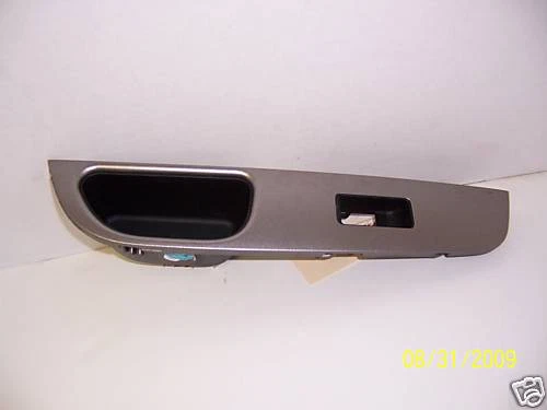 Nissan Versa 2008 bisel interruptor ventana trasera izquierda Foto 1 de 1