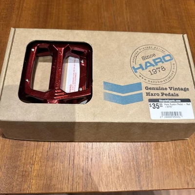 Pedales BMX de aleación roja de 9/16”, serie HARO Fusion Vintage, 6 pines por cara Foto 1 de 4