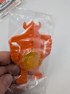 Vintage 1985 Kellogg Müsli Premium Fahrrad Reflektor Orange Roboter Trafo - Bild 1 von 4