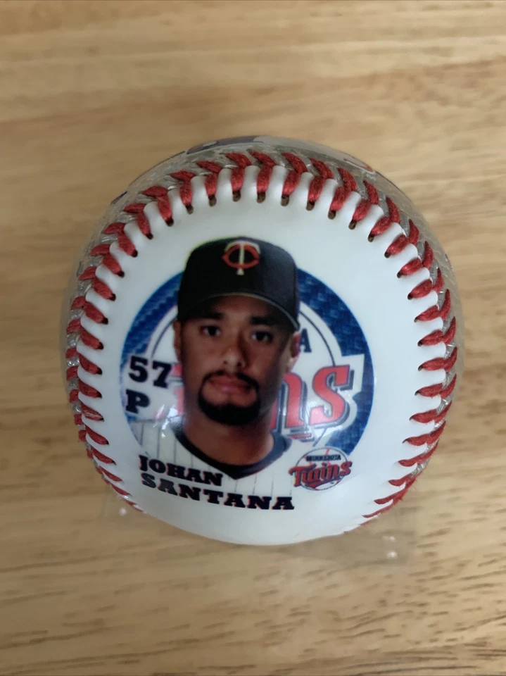 JOHAN SANTANA MINNESOTA TWINS LOGOTIPO FOTO BÉISBOL RAWLINGS PELOTA NY METS Foto 1 de 4