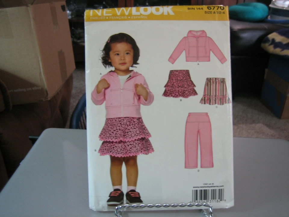 New Look 6770 Girl's Front Zip Hoodie, Skirts & Pants Pattern - Size 1/2-4 - Image 1 of 1