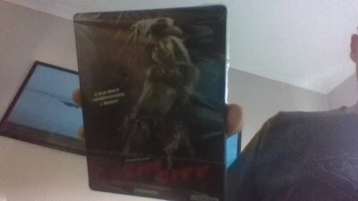 SIN CITY - GERMAN BLURAY STEELBOOK - NEW / SEALED  ('RECUT' & THEATRICAL) - Image 1 of 2