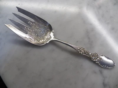 TENEDOR DE SERVIR DE PLATA ESTERLINA TIROLESA AMSTON/WHITING CON FLORES 9 3/8" SIN MONO Foto 1 de 4