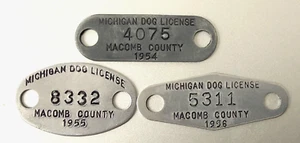 3 MICHIGAN DOG LICENSE TAGS: Macomb County 1954, 1955 & 1956 - Picture 1 of 1